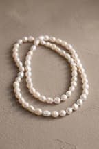 DropIQ long knotted white baroque pearl strand